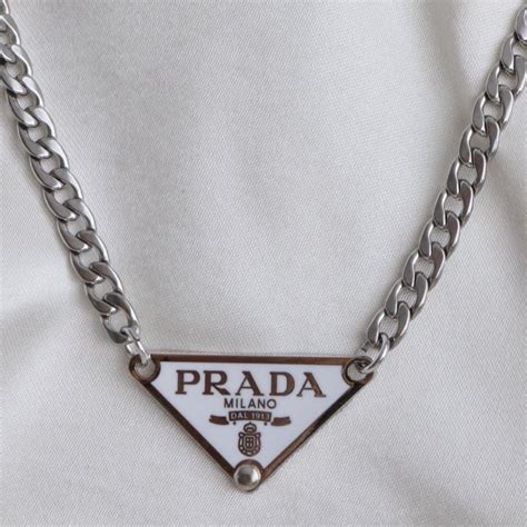 white prada necklace.